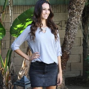 Gray knit blouse with roll up sleeves